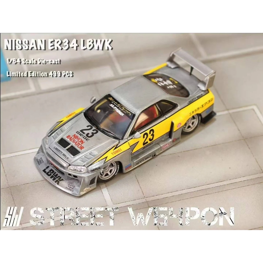 Nissan Skyline GT-R GTR R34 ER34 LBWK #23, 1:64 Scale (Silver & Yellow) — image 1