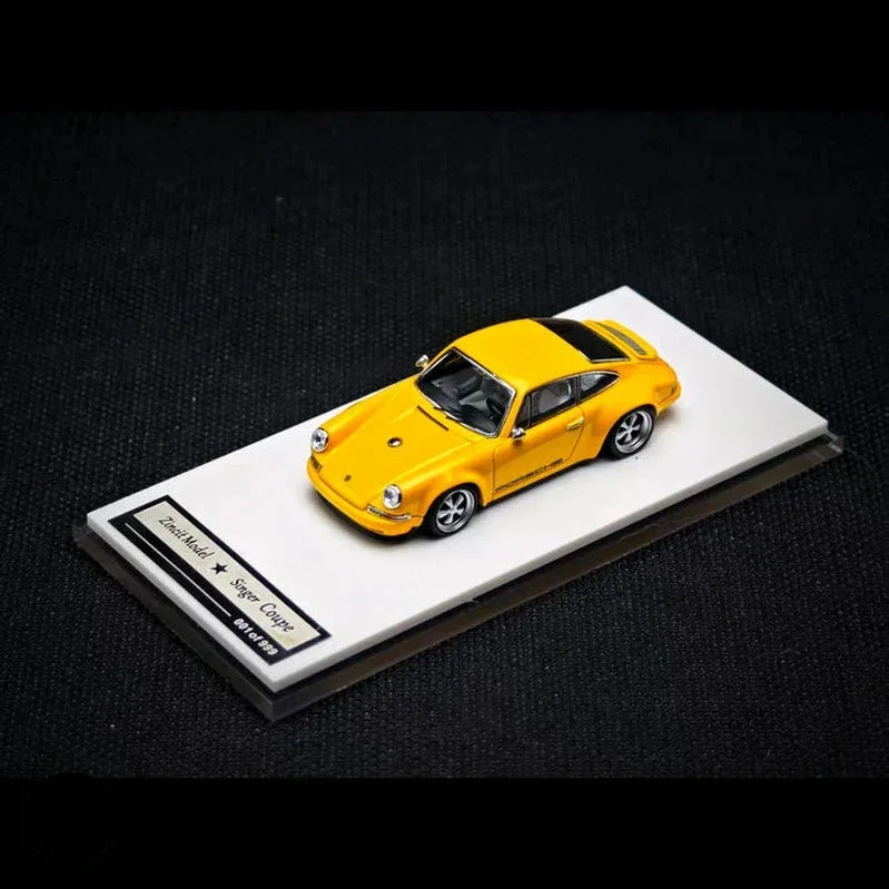 Porsche diecast 911 Carrera RS 2.7 (1973) (Ducktail Version) Limited to 999, 1:64 Scale (Yellow) — image 1