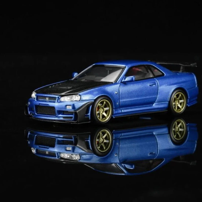 *PRE-ORDER* Nissan Skyline GT-R (R34) Customized W/GT Aero Kit, 1:64 Scale (Bayside Blue) — image 1