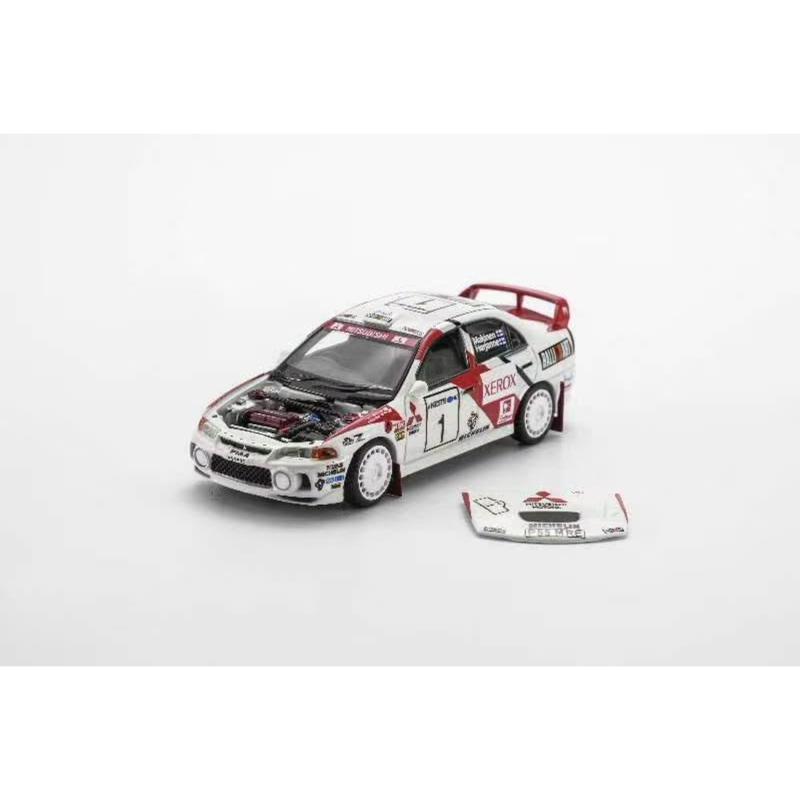 *PRE-ORDER* Mitsubishi Lancer Evolution IV GSR Finland Rally Winner 1997, 1:64 Scale — image 1