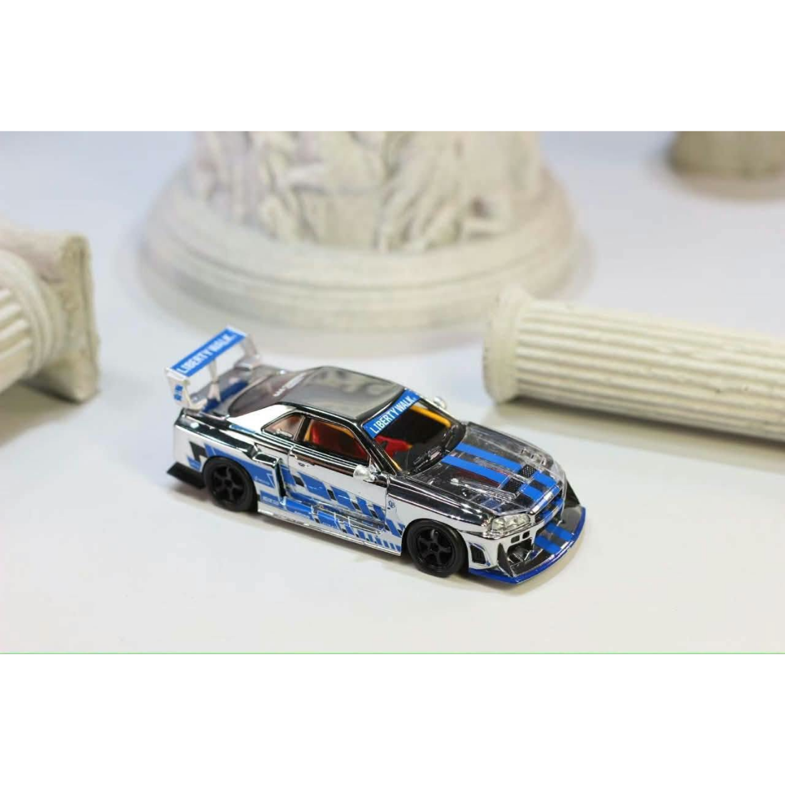 *PRE-ORDER* Nissan Skyline R34，ER34 Super Silhouette (Open-Hood, Visible Engine) Chrome Silver-Blue, 1:64 Scale — image 3