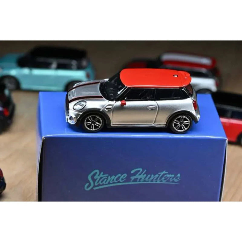Mini Cooper Silver with Red Roof Top, 1:64 Scale — image 1